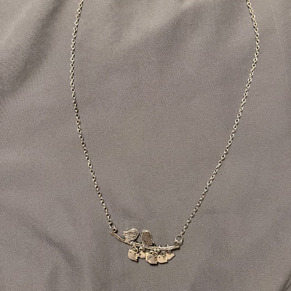 Silver family of birds necklace